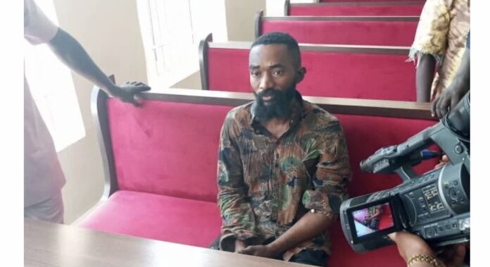 Gospel artist found with girlfriend's head denies commiting murder