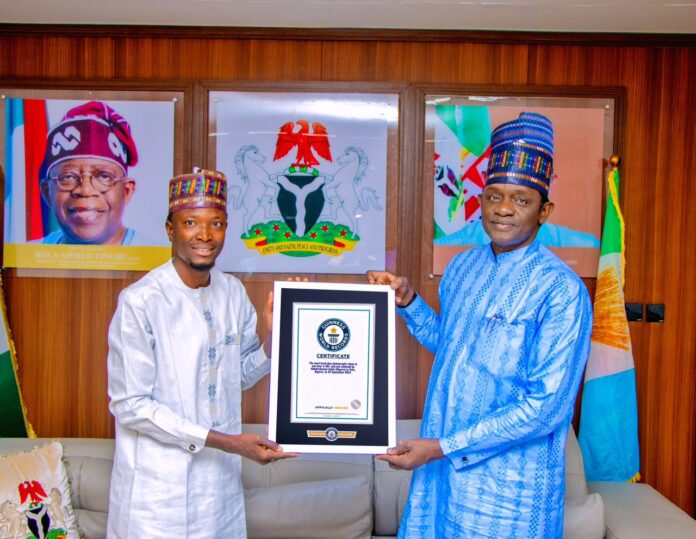 Yobe record holder, Abdulrahaman, presents Guinness World Record certificate to Gov. Buni (Pictures)