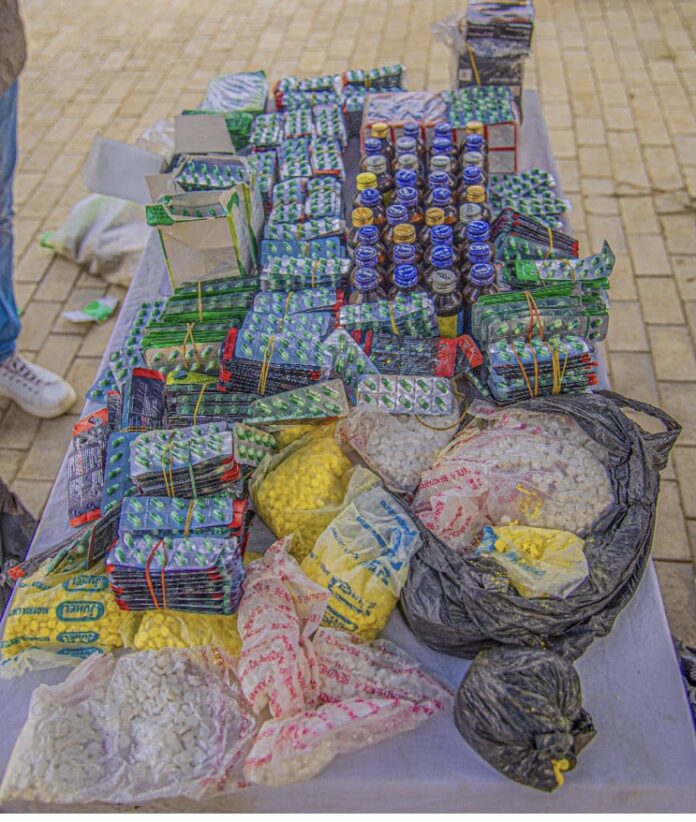 Police arrest woman with weapons concealed inside palm oil