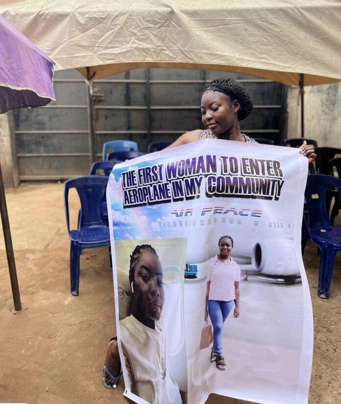Lady throws celebration party as first woman to travel by air in her community