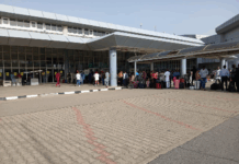 Lady faints at Abuja airport after scuffle over missing flight Lady faints at Abuja airport after scuffle over missing flight